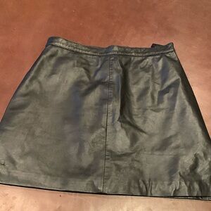 Women’s black leather skirt.